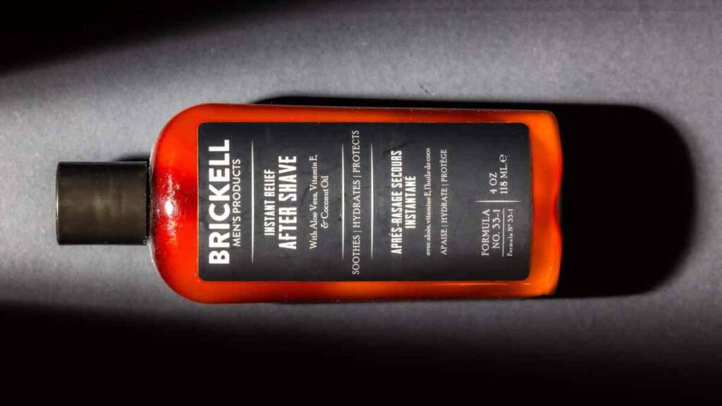 Brickell aftershave bottle on surface