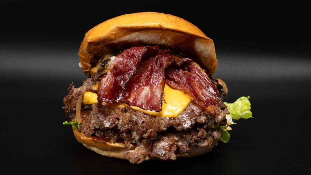 Juicy burger with bacon and cheese