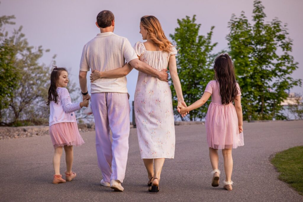 Family walking together in nature.